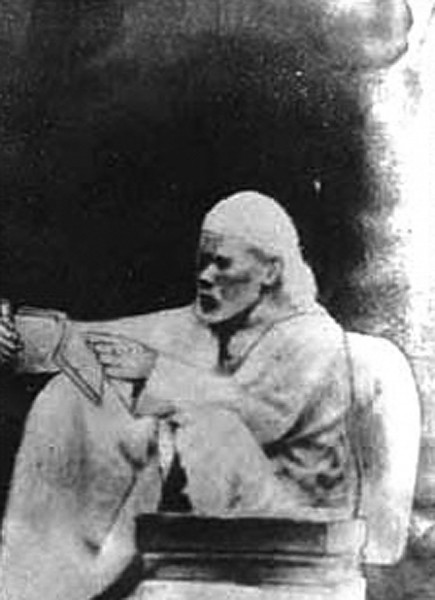 Shirdi_Sai_Baba_reading_