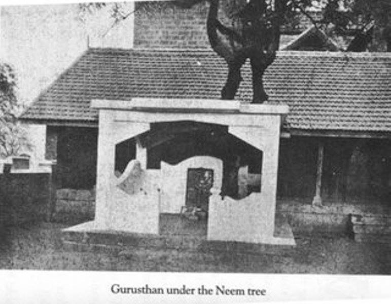 Old Gurusthan under neem tree with Sathe Wada behind 